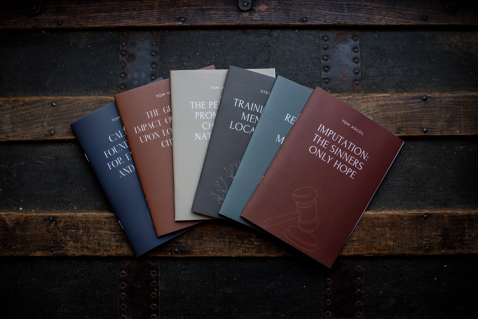 Image of assorted pamphlets on a dark background