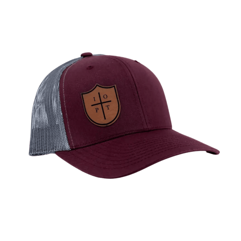 Red hat with IOPT logo on leather patch