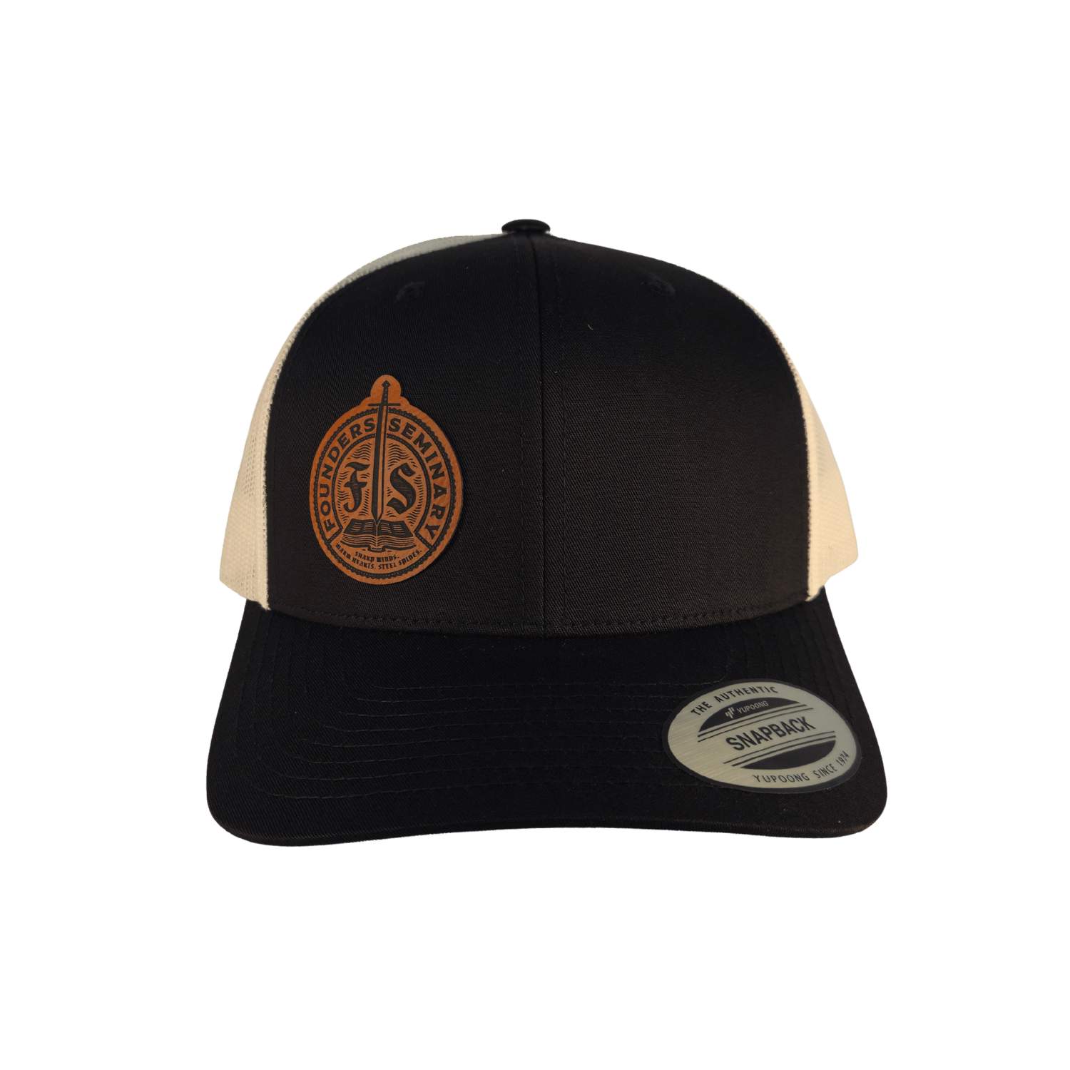 A black and off-white trucker cap with a circular brown embroidered logo on the front panel. The cap features a black brim 