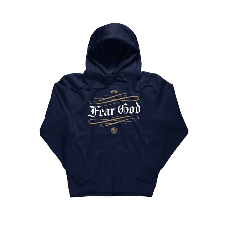 A navy blue pullover hoodie with a front graphic that reads 'Fear God' in white gothic lettering, decorated with gold swirls, a small gold crown above, and a small gold shield below. The hoodie is shown flat against a solid white background. [Navy Blue]
