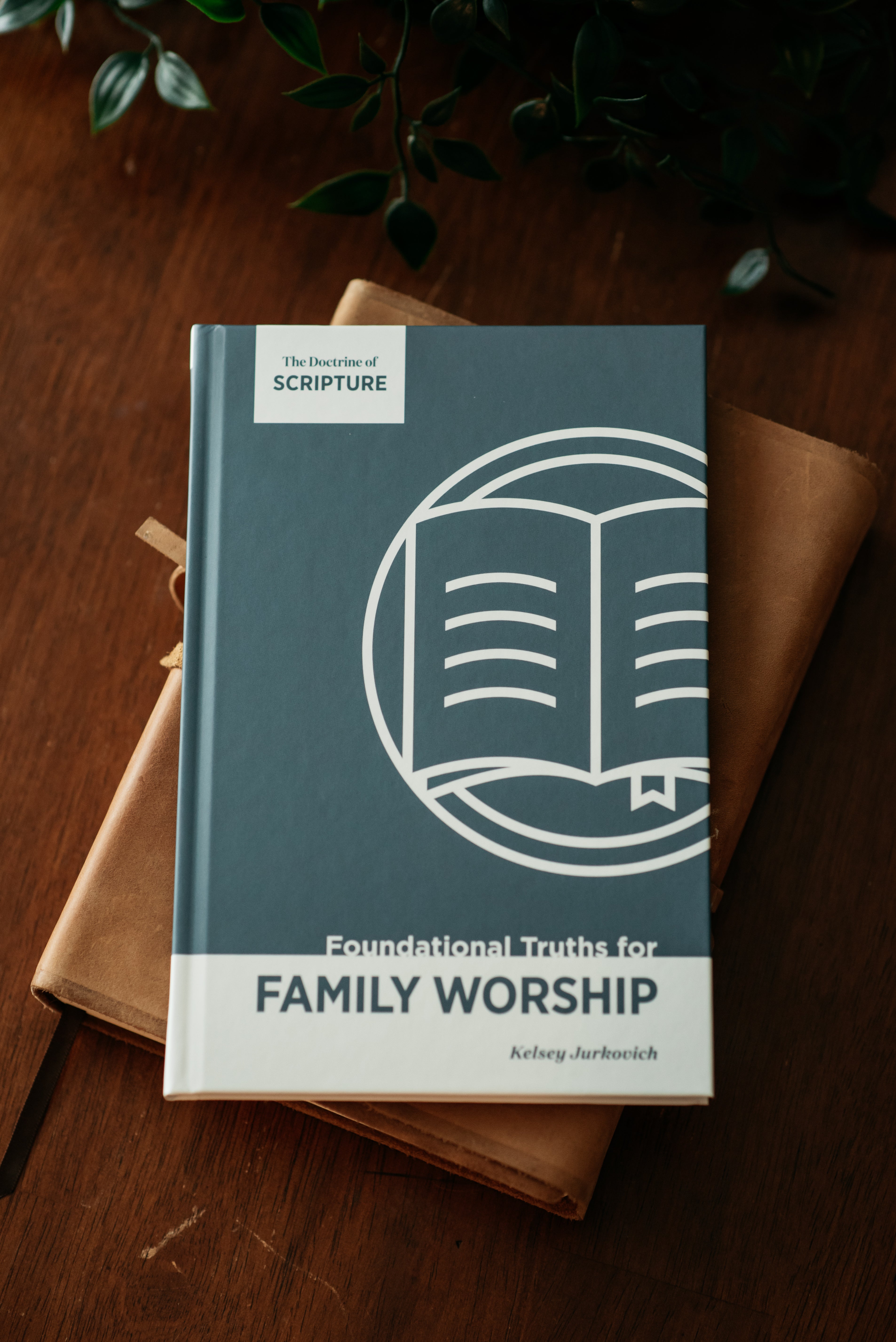 Picture of Foundational Truths for Family Worship book on wood table.