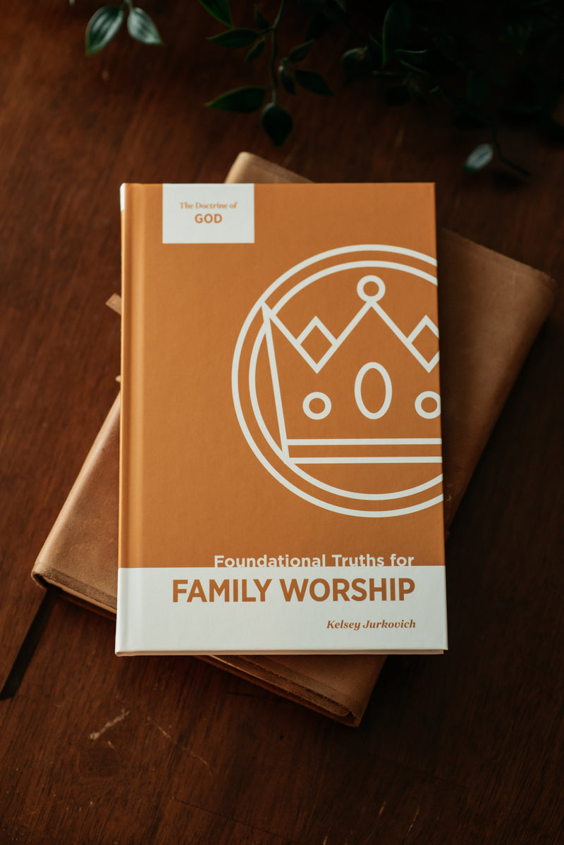 Picture of Family Worship Guide book 2 on wood table