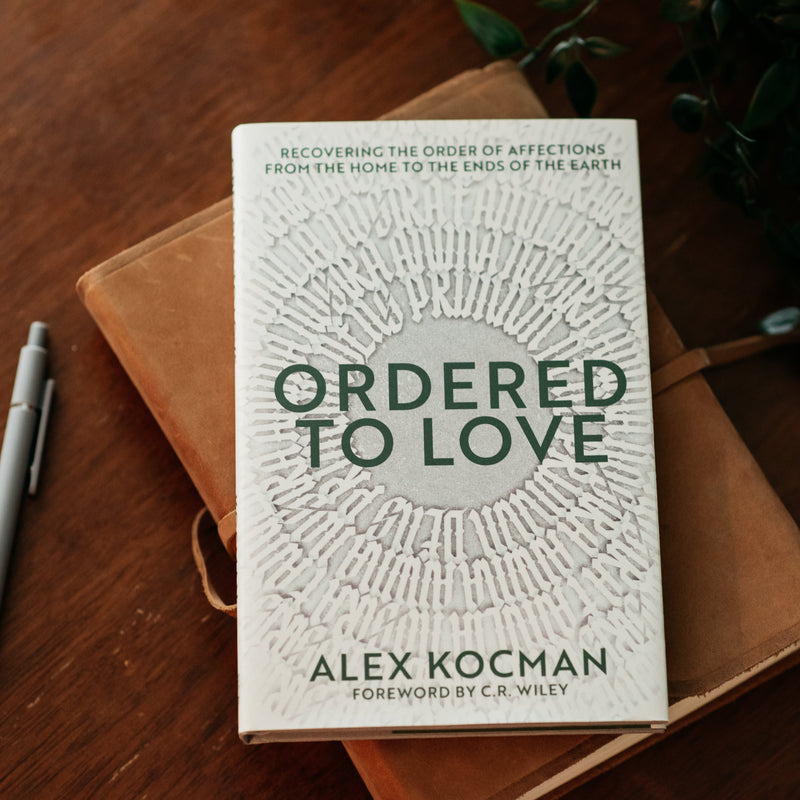 Ordered to Love book on wood table