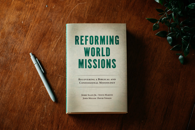 Picture of 'Reforming World Missions' on a wood background