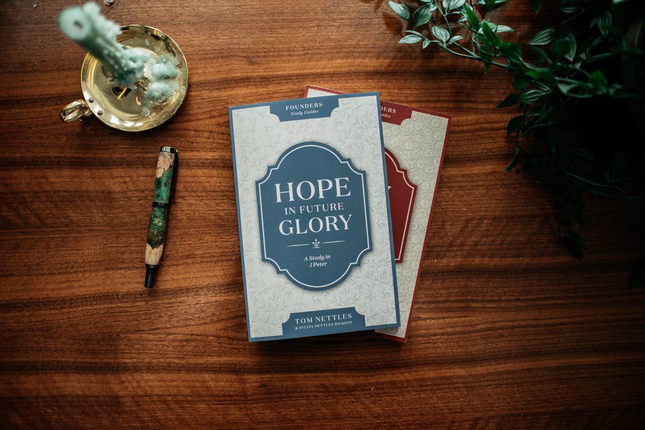 Book cover of 'Hope in Future Glory' by Tom Nettles and Sylvia Nettles Dickson on a wood background