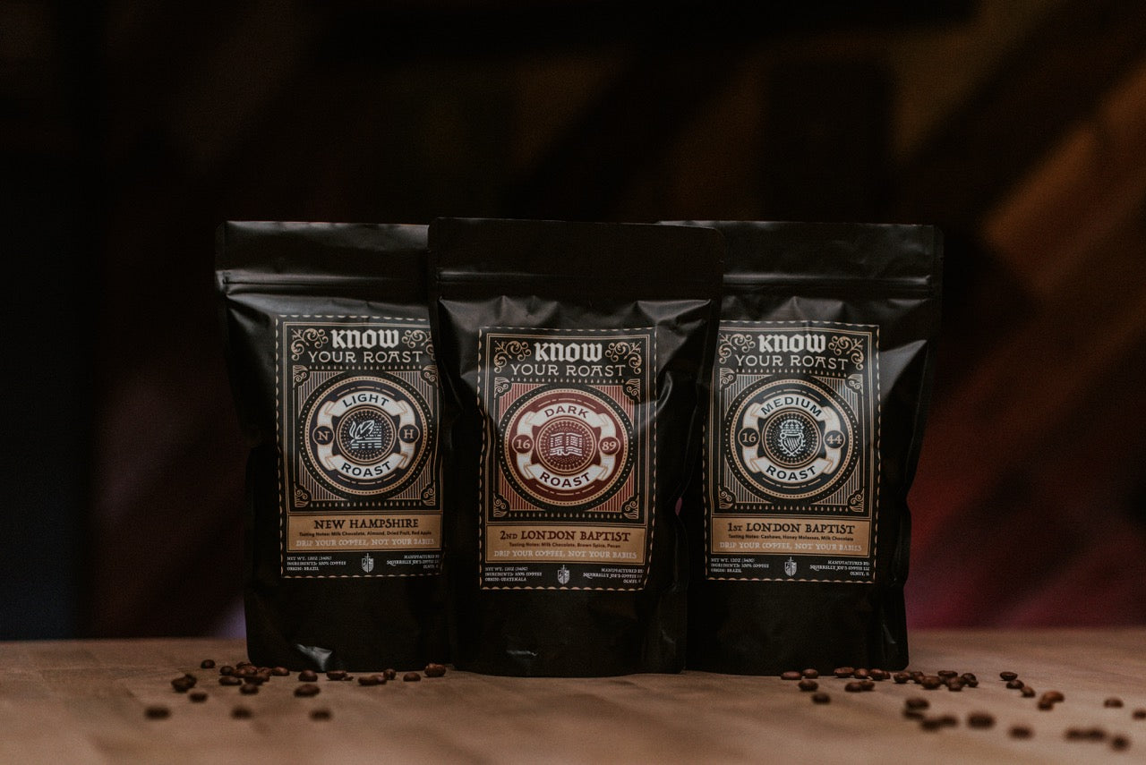 Three Bags of Know Your Roast Coffee: New Hampshire Light Roast Coffee on wood table