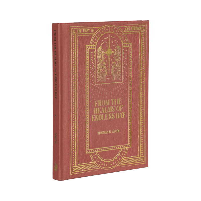 Red book with gold embossed design on a white background