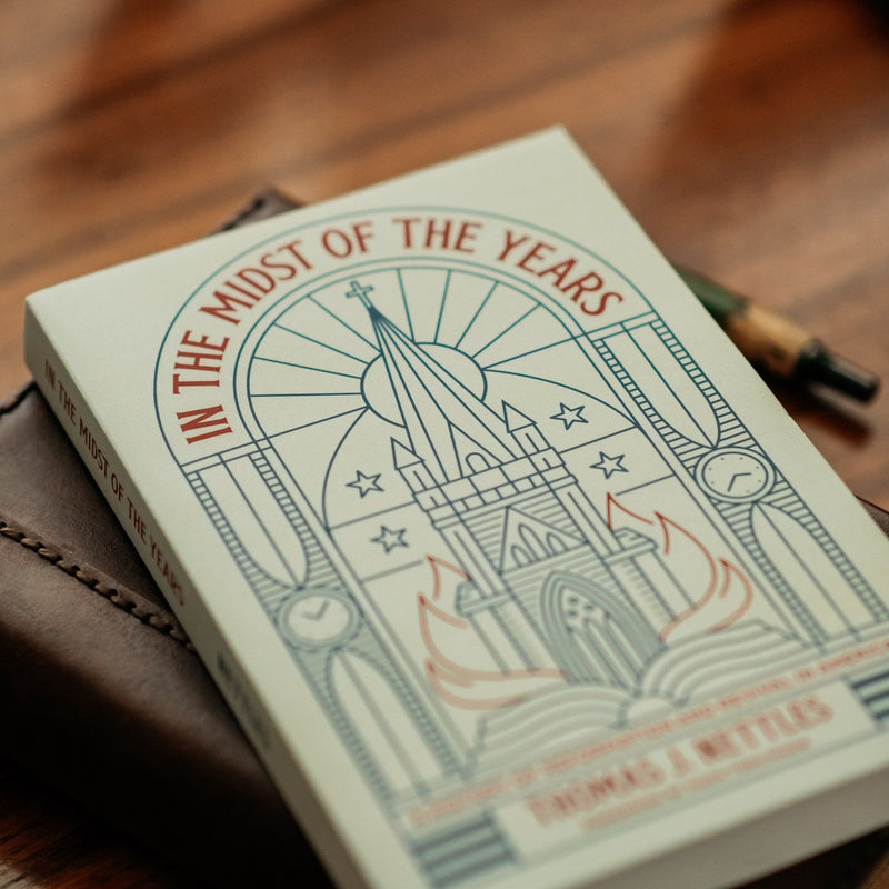Book titled 'In the Midst of the Years' on a wooden surface