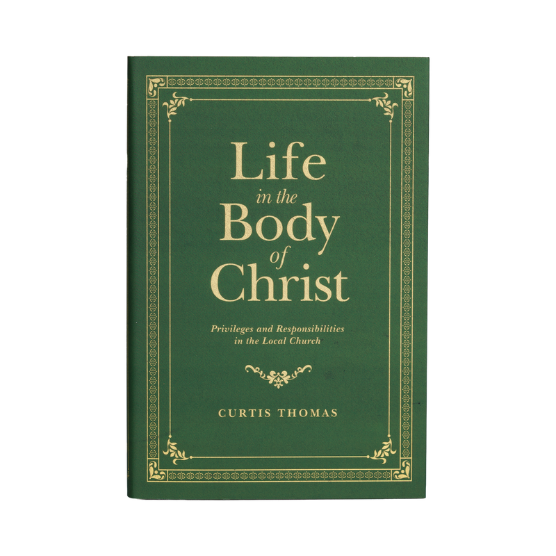 Book titled 'Life in the Body of Christ' by Curtis Thomas on a green background