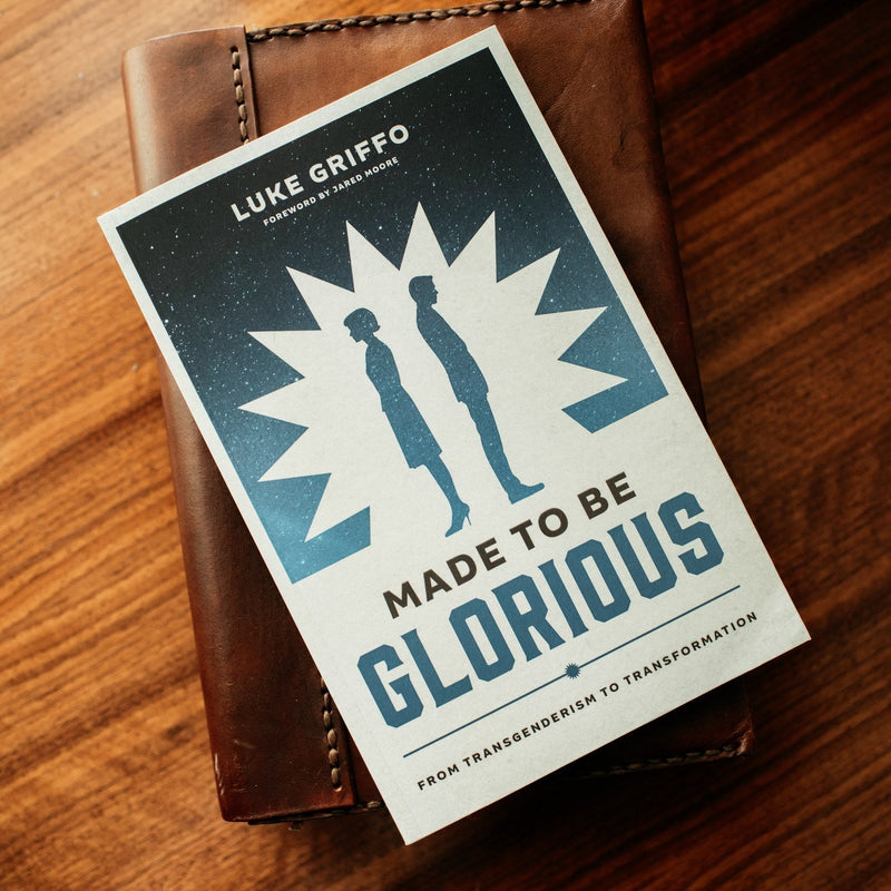 Book titled 'Made to Be Glorious' by Luke Griffo on a wooden surface