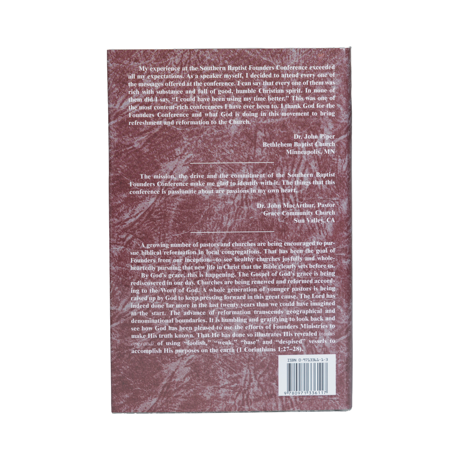 Back cover of a book with text and a barcode on a maroon background