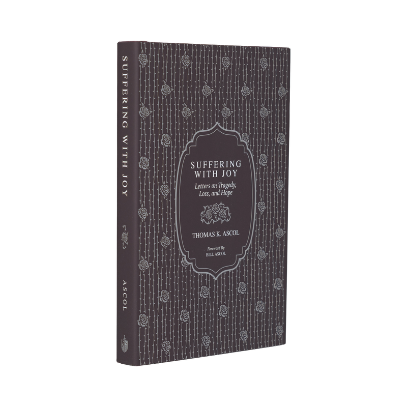 Book titled 'Suffering with Joy' by Thomas K. Ascol on a white background
